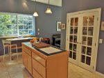 Equipped with a Center Island and Pantry filled with many Kitchen amenities 